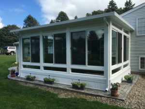 Studio Sunroom in Shelby Township with Stamped Concrete Floor